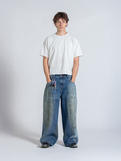 MUD STAINED JEANS - DARK BLUE