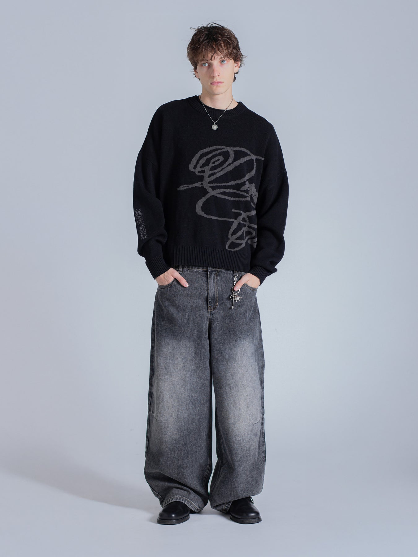 Essentials Cursive Knit CURSIVE TEXT KNIT - BLACK – DRMERS CLUB