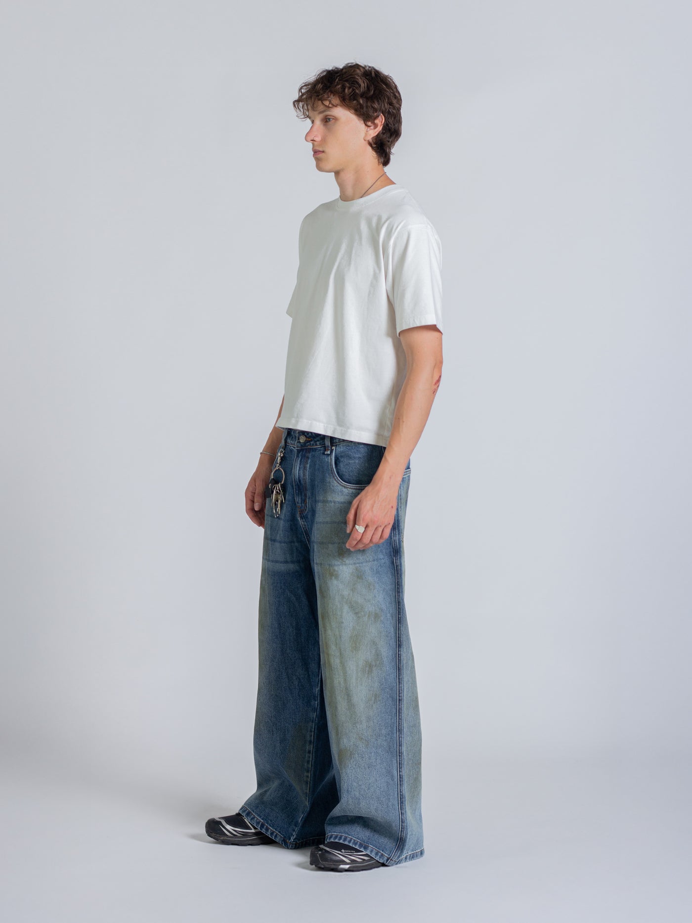 MUD STAINED JEANS - DARK BLUE