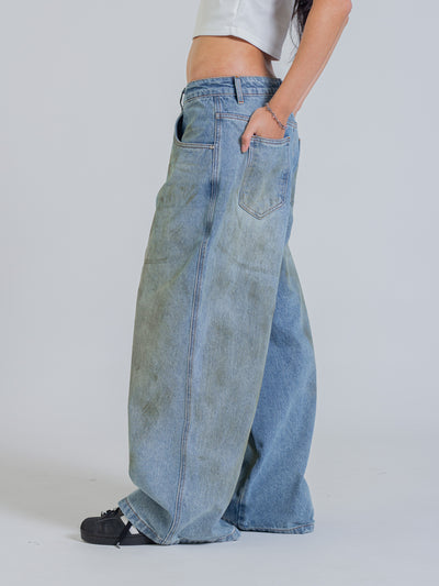 MUD STAINED JEANS - LIGHT BLUE