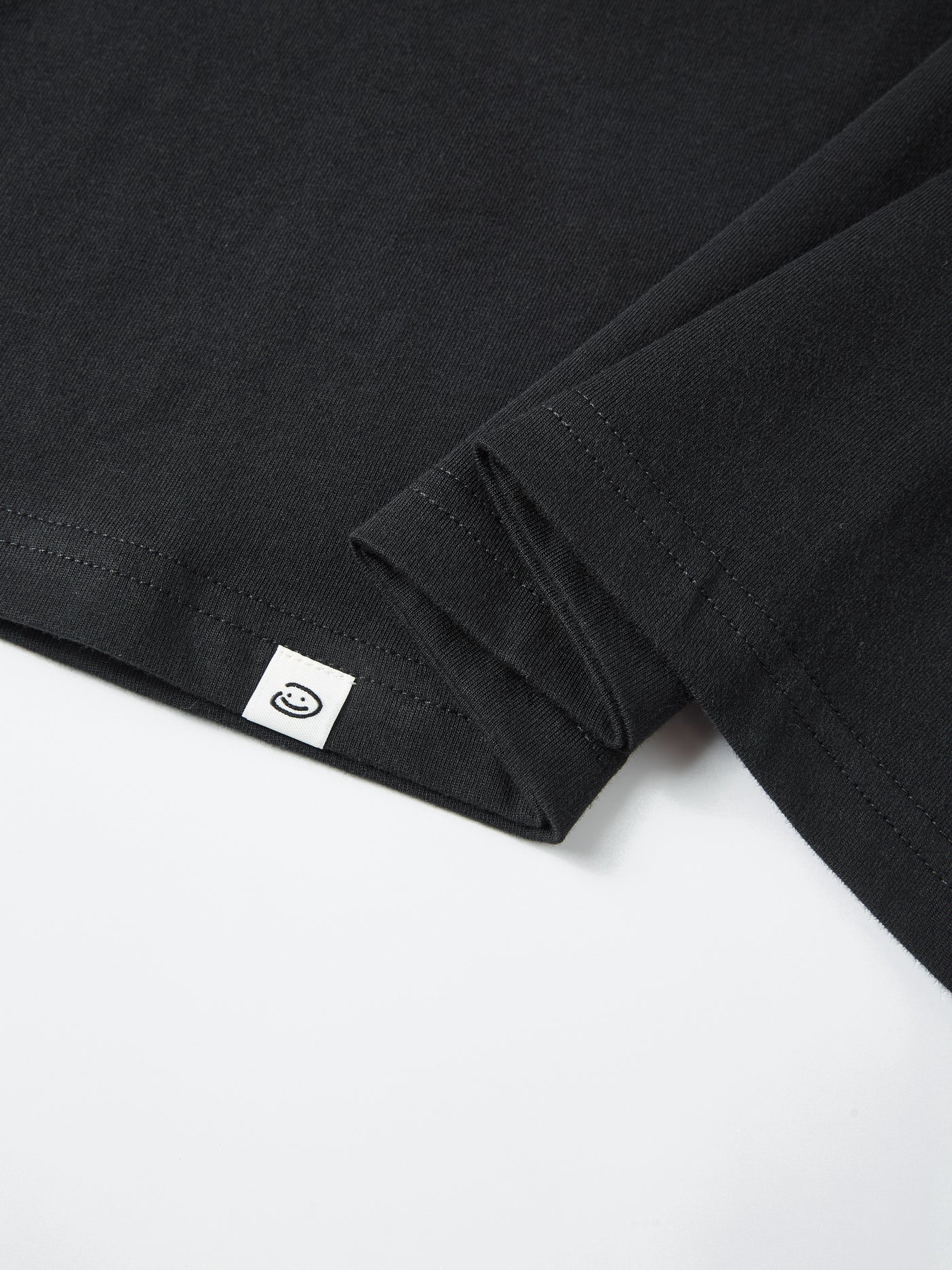 FADED STARS SMILEY TEE - BLACK