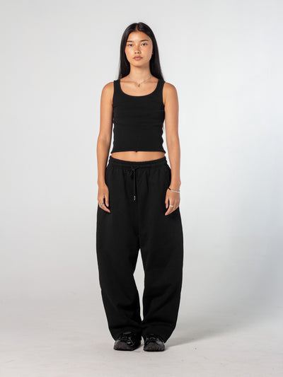 MONOPOLY MAN X DRMER KID SWEATPANTS - BLACK