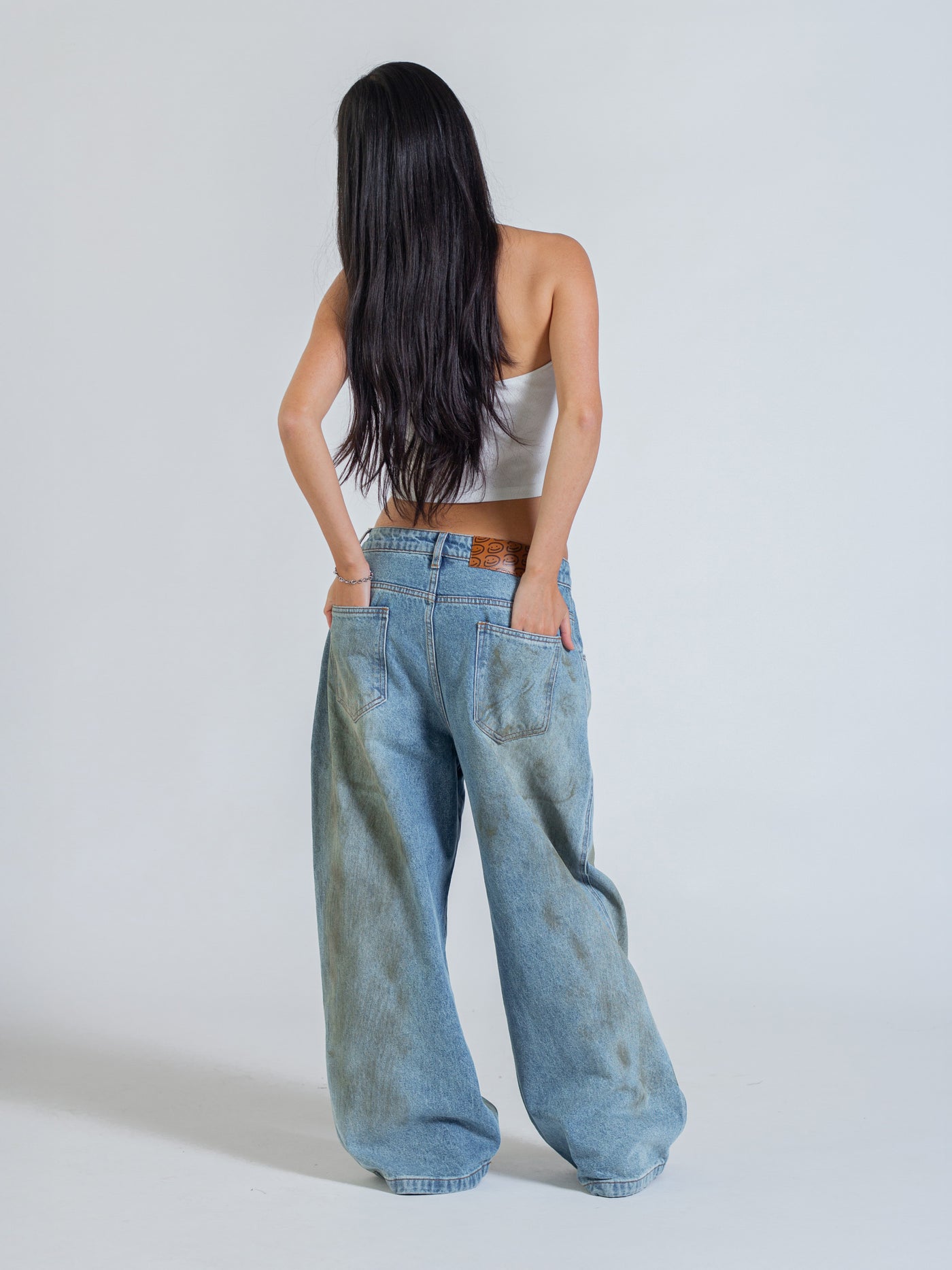 MUD STAINED JEANS - LIGHT BLUE