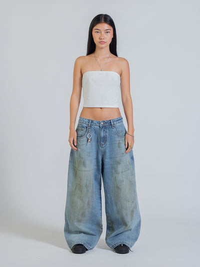 MUD STAINED JEANS - LIGHT BLUE
