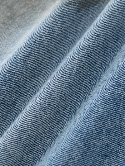 MUD STAINED JEANS - LIGHT BLUE