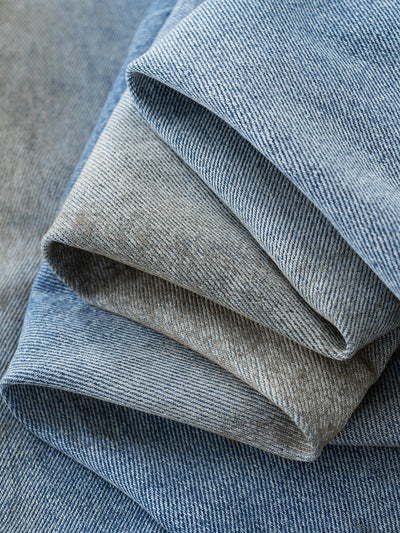 MUD STAINED JEANS - LIGHT BLUE
