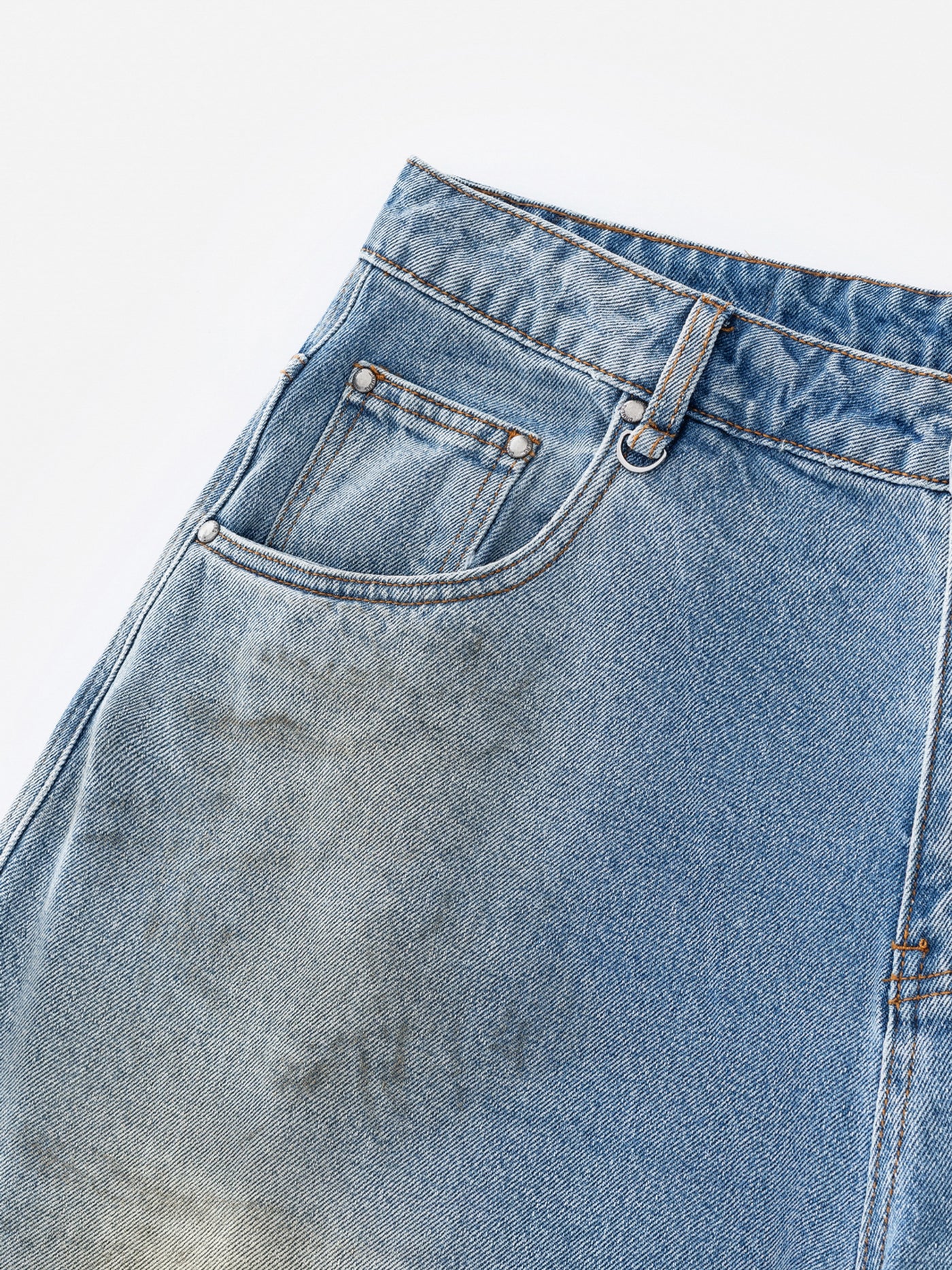 MUD STAINED JEANS - LIGHT BLUE