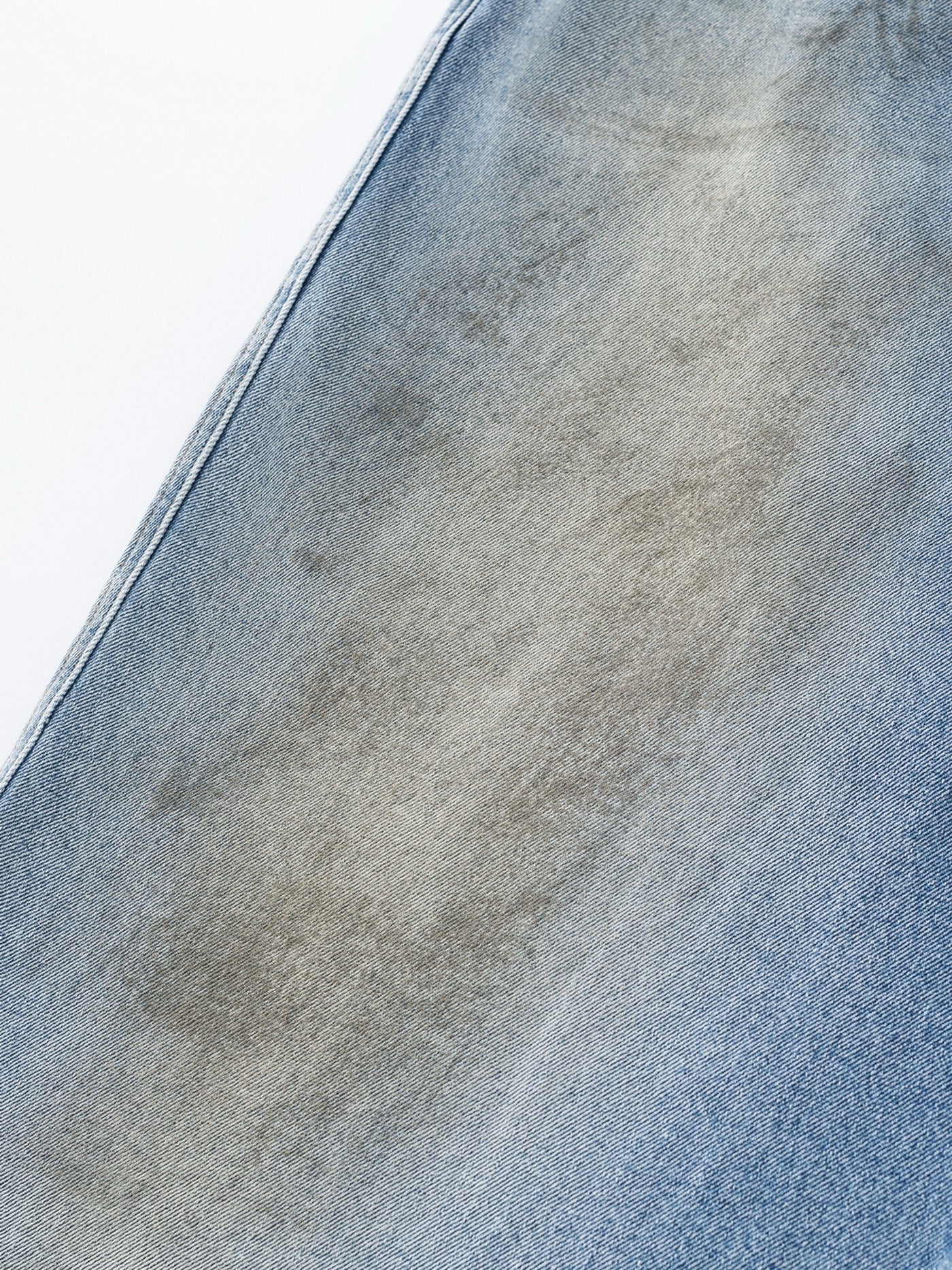 MUD STAINED JEANS - LIGHT BLUE
