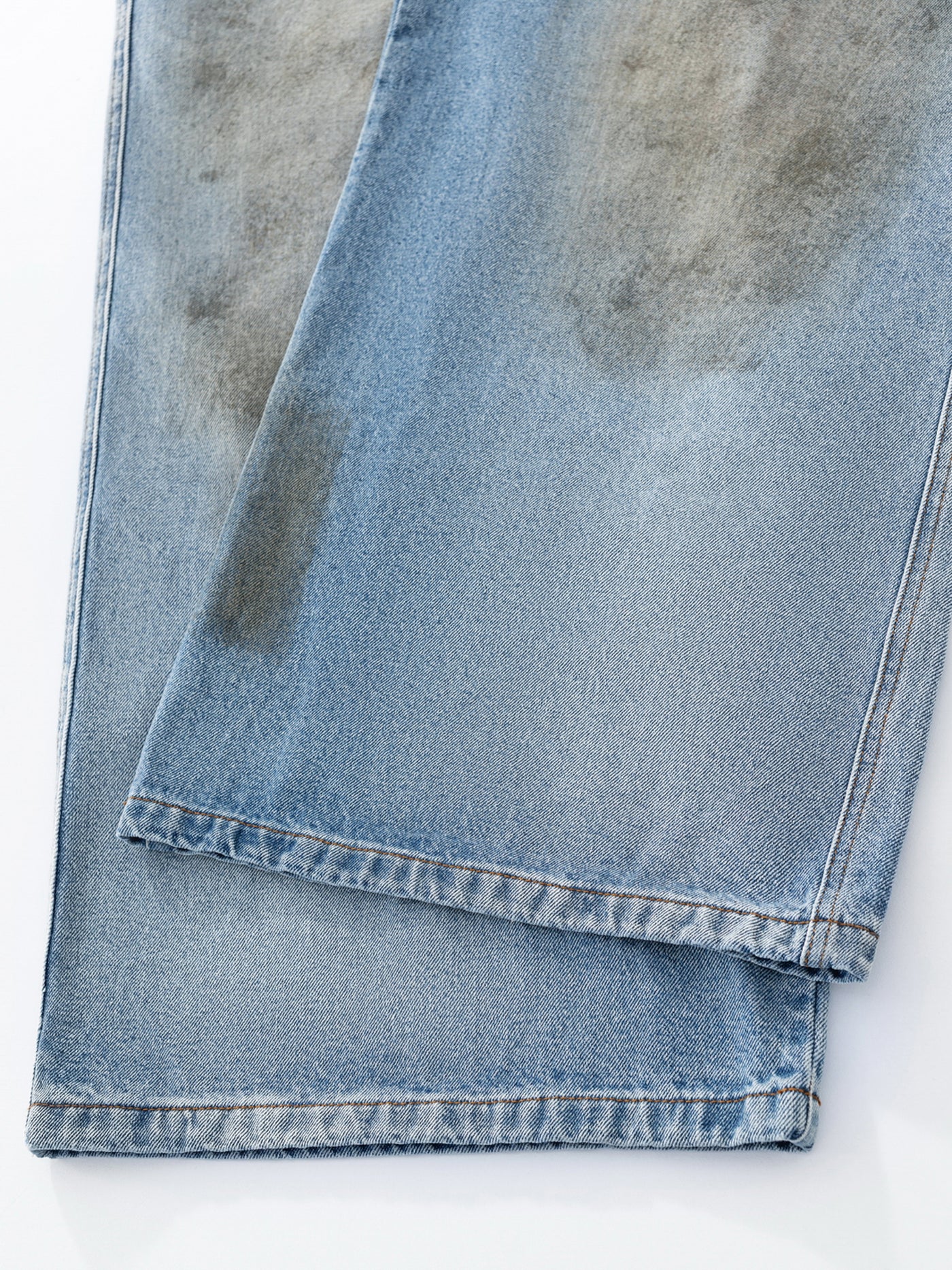 MUD STAINED JEANS - LIGHT BLUE
