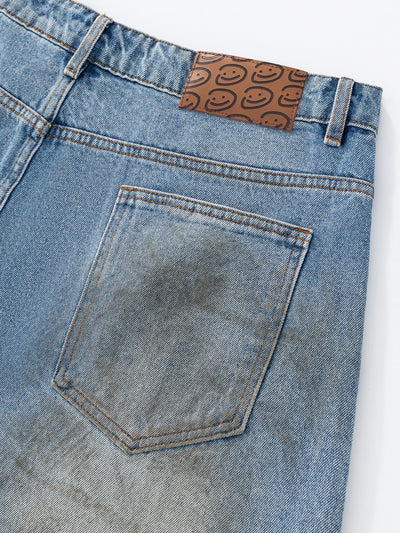 MUD STAINED JEANS - LIGHT BLUE