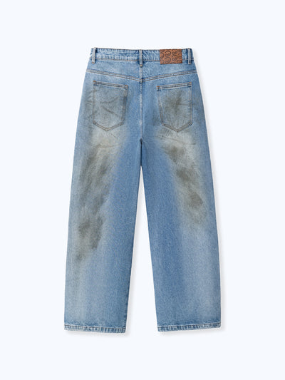 MUD STAINED JEANS - LIGHT BLUE